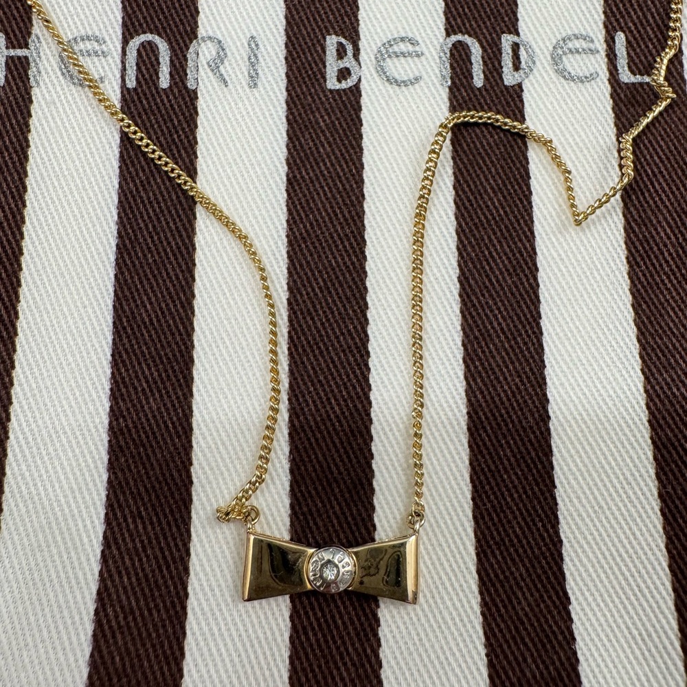 Henri Bendel Gold Bow Necklace with Silver Accent